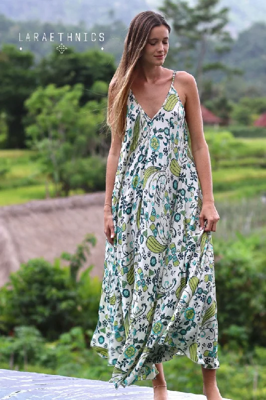 Get More for Less!Calypso crm turquoise strappy dress