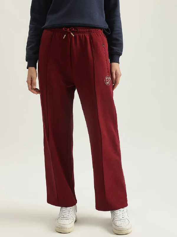 Huge Savings – Act Now!Elle Women Red Solid Straight Fit Mid-Rise Track Pant