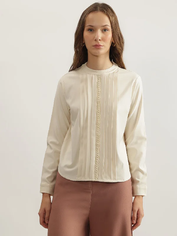 Hottest Discounts of the Year!Iconic Women Cream Solid Round Neck Full Sleeves Top